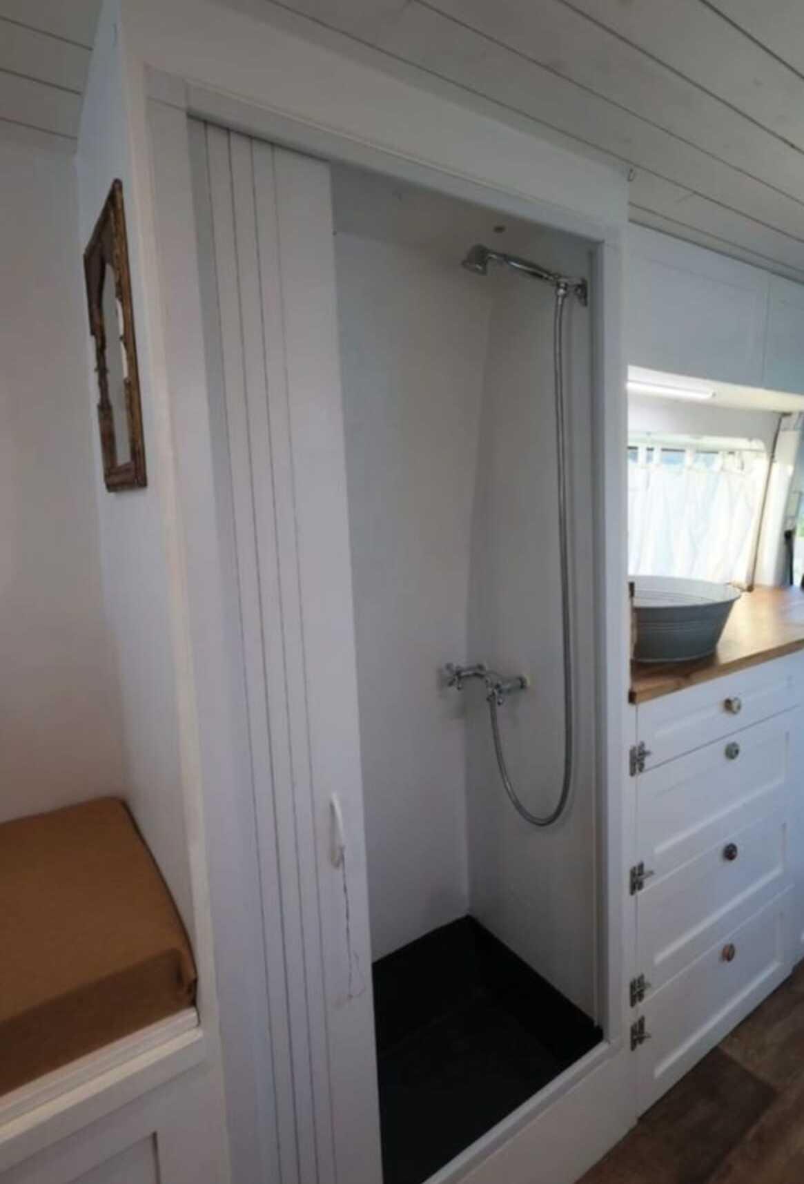 Campervan interior shower and kitchen Albania van rental